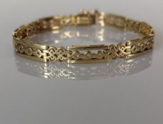 A gold fancy-link bracelet, 19 cm, unmarked but tests for 14ct gold, 17.3g