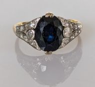 An Art Deco sapphire and diamond ring, the oval sapphire 7 x 10mm 