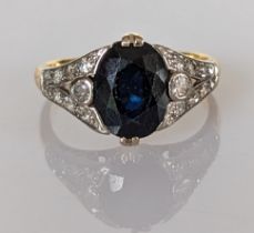 An Art Deco sapphire and diamond ring, the oval sapphire 7 x 10mm