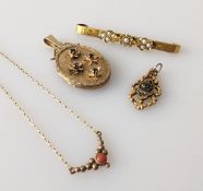 An Edwardian oval gem-set yellow gold locket, a seed pearl-set brooch, another pendant
