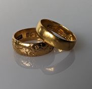 A mid-century 22ct yellow gold wedding band with etched decoration, 5mm and another, 4mm, sizes K, M