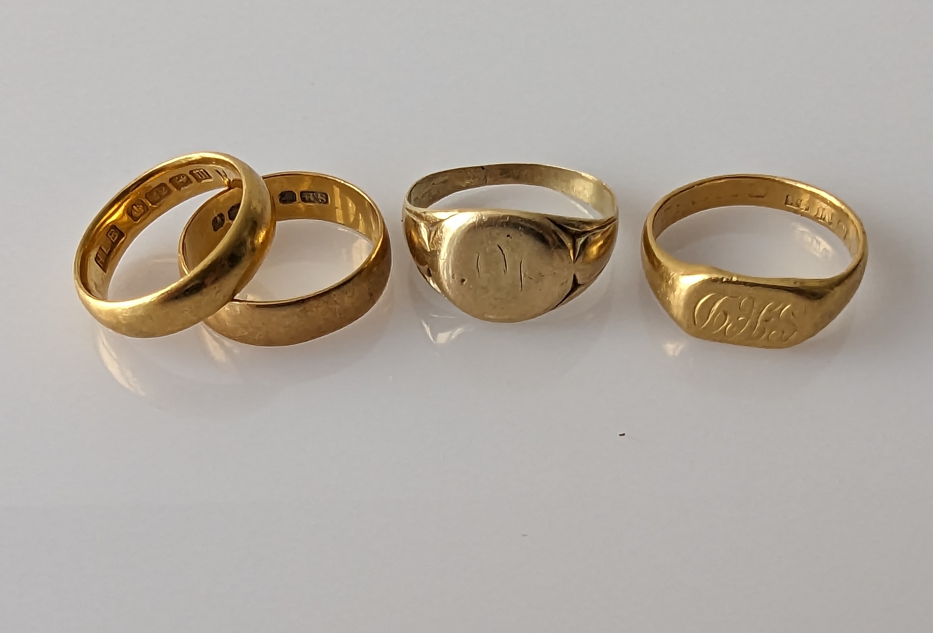 Two 22ct yellow gold wedding bands, both 5mm and two 18ct yellow gold signet rings - Image 2 of 2
