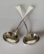 A pair of George III silver sauce ladles by William Eley I, William Fearn & William Chawner, London