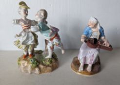 A 19th century Meissen group of two figures dancing on a raised base, 16 cm H, repair to neck