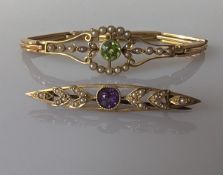 An Edwardian peridot and seed pearl bracelet on a gold bracelet setting, articulated links