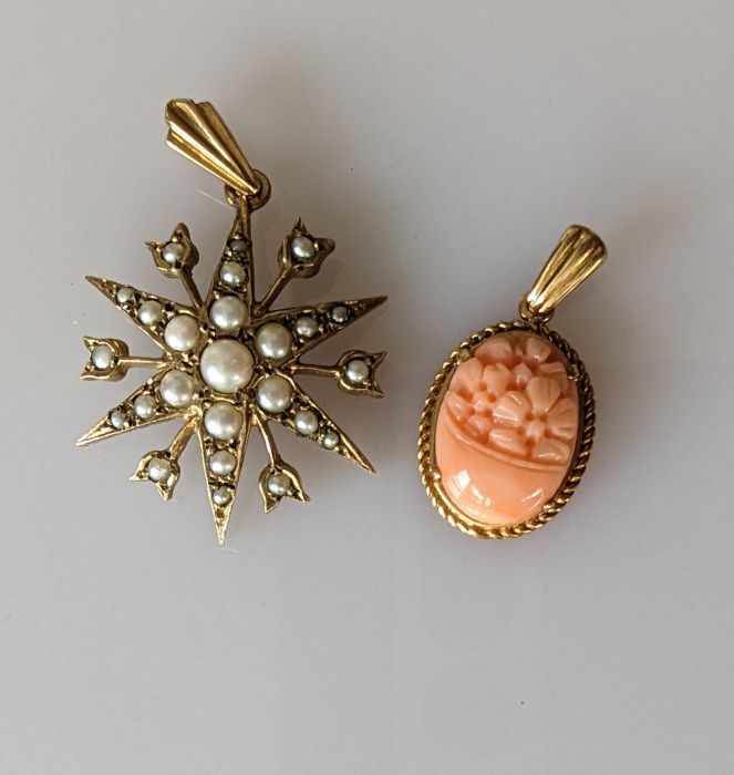A Victorian-style gold star pendand with seed pearl decoration, 25mm and a carved oval coral pendant