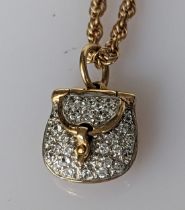 A faux-diamond and gold pendant chain, hallmarked 9ct, 45 cm, 7.77g