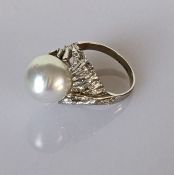 A vintage white gold and pearl dress ring, stamped 14k, size N, 7g