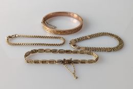 A 14ct yellow gold fancy-link bracelet, 6.5g, stamped; two others on 9ct gold, all 17 cm