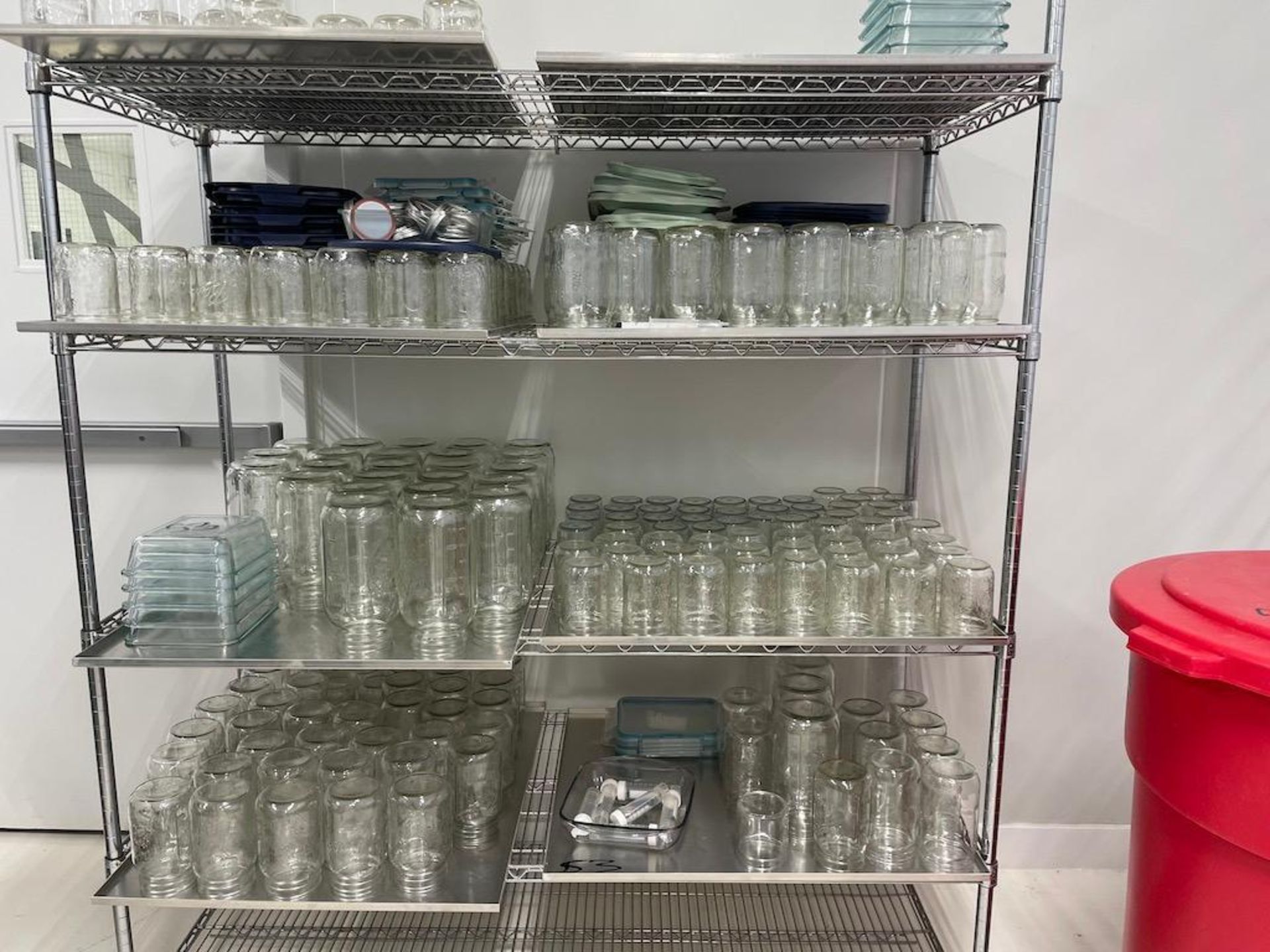 LOT: (4) NSF SS TABLES 6 FT X 30 IN X 34 IN, (1) 4 FT X 2 FT X 3 FT, 5 SHELF WIRE RACK W MASON JAR C