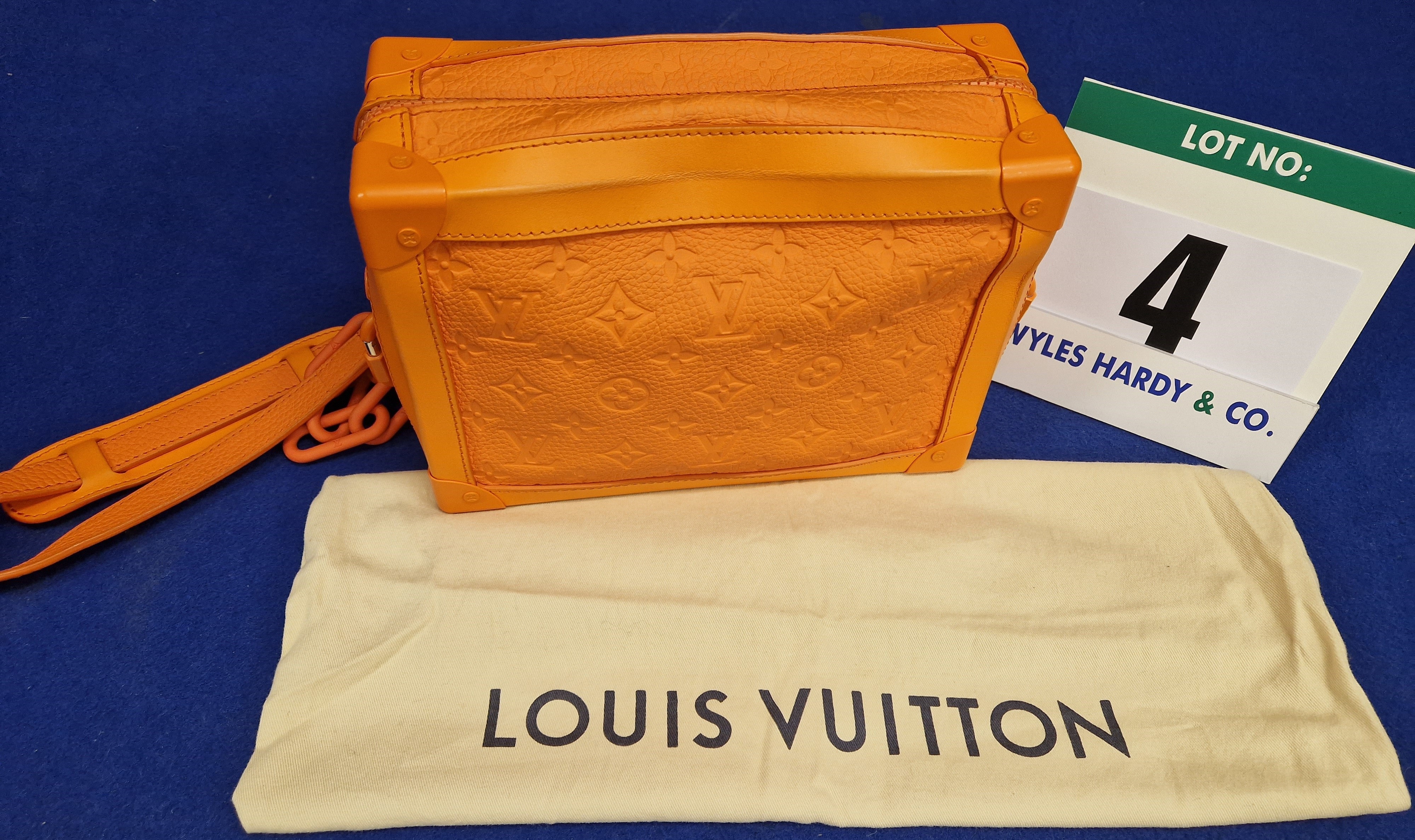 A Limited Edition LOUIS VUITTON X Virgil Abloh Orange Taurillon Cowhide Leather Soft Trunk Bag