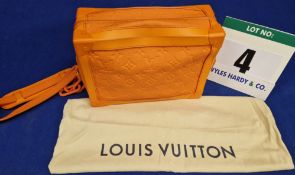 A Limited Edition LOUIS VUITTON X Virgil Abloh Orange Taurillon Cowhide Leather Soft Trunk Bag