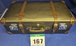 A GLOBE-TROTTER Caviar Medium Check-In Suitcase with Metallic High Shine Finish and Brown Leather
