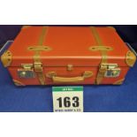 A GLOBE-TROTTER Centenary Carry-On 4-Wheel Trunk Suitcase in Red Leather with Caramel Leather