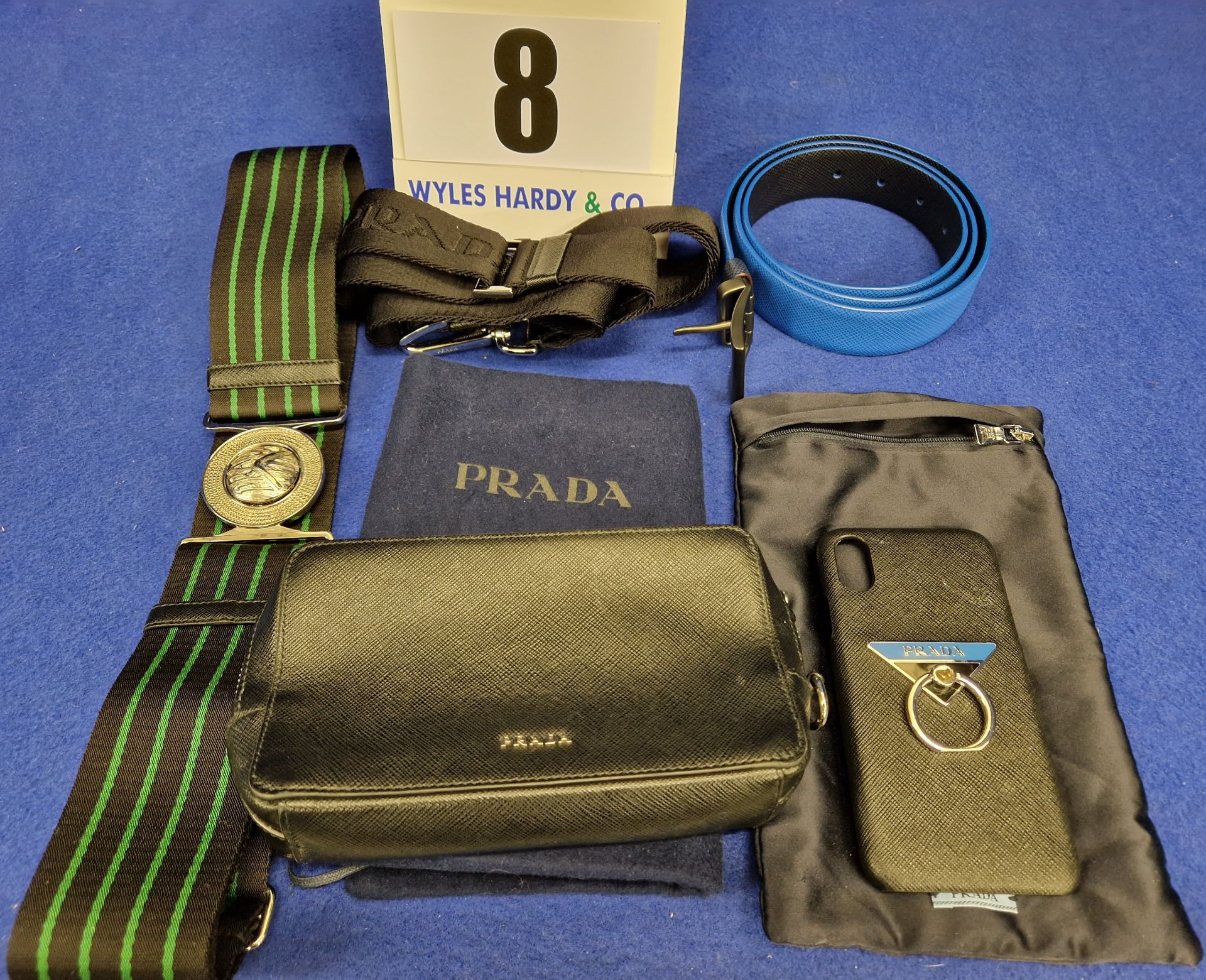 A Collection of PRADA Accessories comprising:- - A PRADA Black Saffiano Leather Small Pouch/Clutch