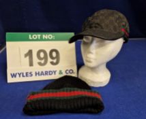 A GUCCI Black Canvas Cap with Black Embossed Double G Logo with Red and Green Stripe detailing, Size