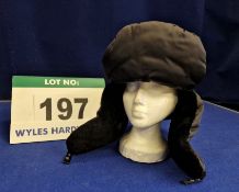 A PRADA Black Nylon Winter Hat with Ear Flaps and 100 per cent Dyed Black Sheepskin Lining with