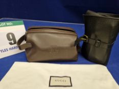 A GUCCI Black Leather Shoe Cleaning Roll/Valet Kit complete with Leather Creams, Various Brushes,