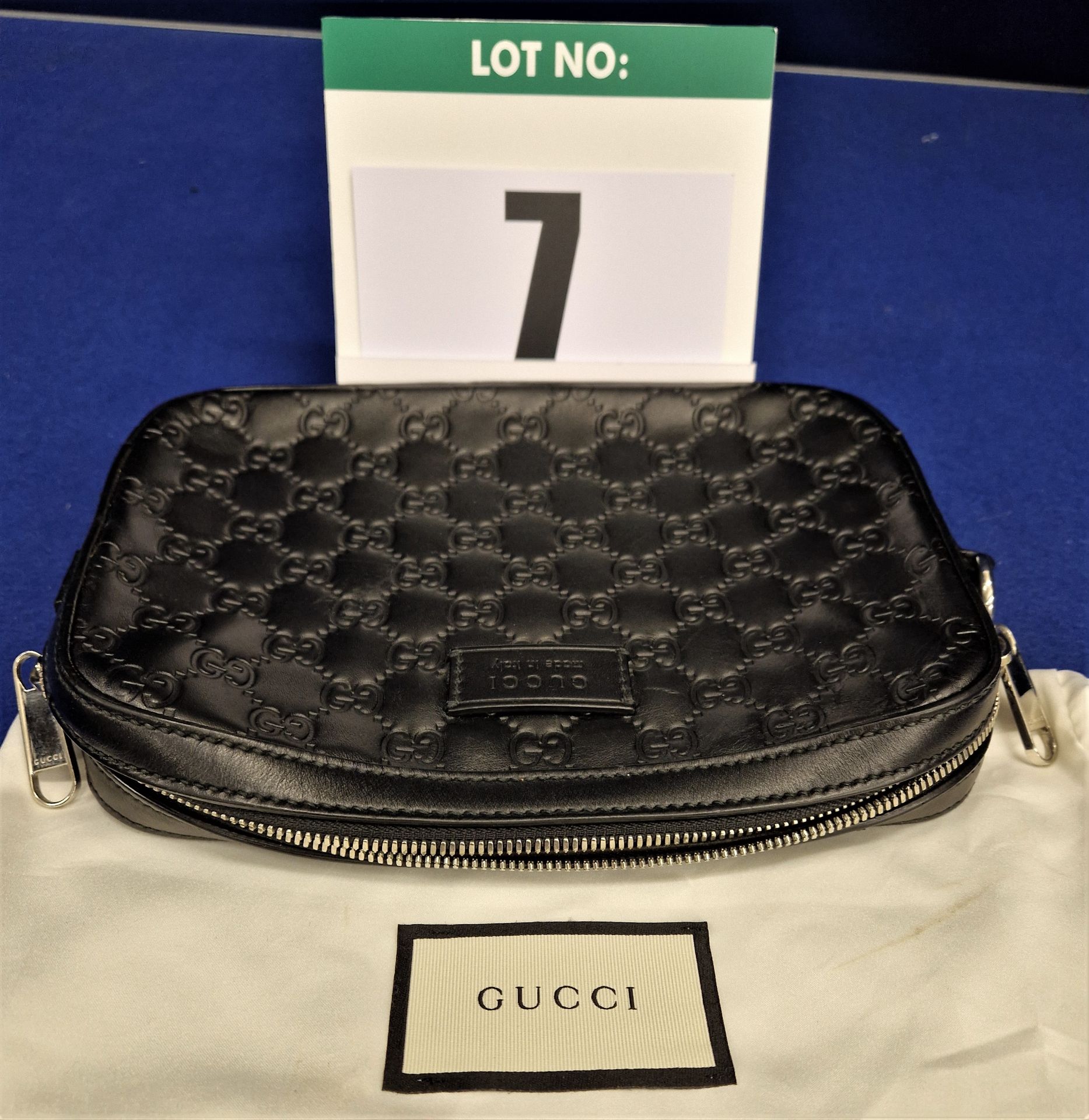A GUCCI Black Double G Monogram Embossed Leather Pouch/Clutch Bag with Grey Suedette Lining,