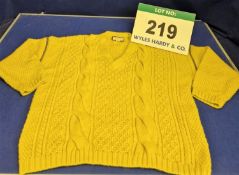 A GUCCI 100 per cent Wool Chunky Knit Jumper in Mustard with Round Neck and Zip Detail to Sleeves.