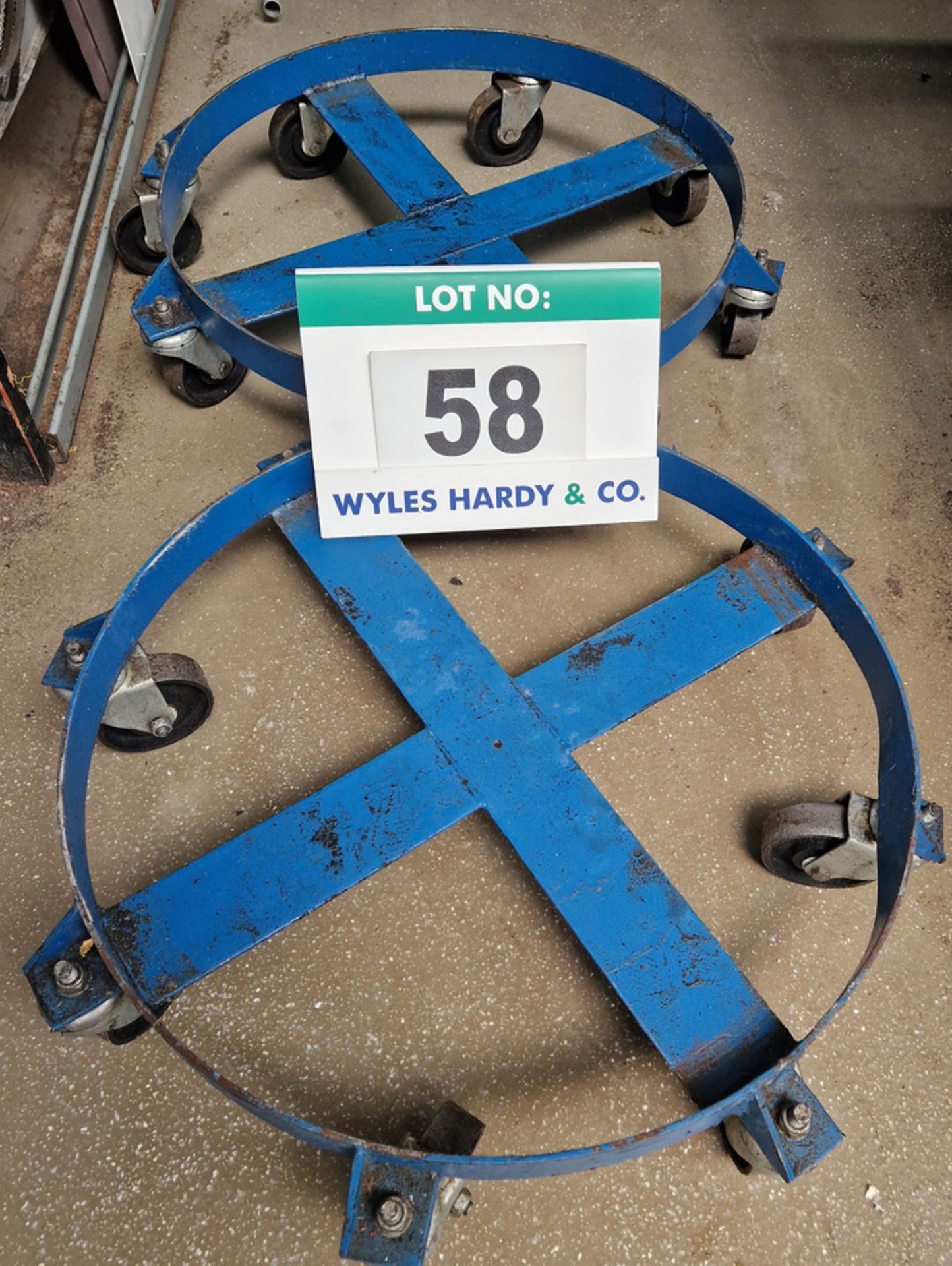 Two Blue Steel Circular Drum Mobile Stands, each 620mm diameter