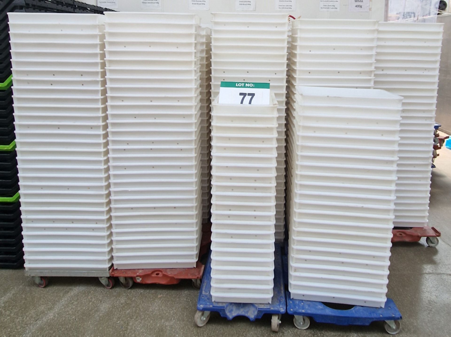 Seven Hundred and Fifty Four White Plastic Bread Trays, each approx. 330mm x 540mm x 10mm tall