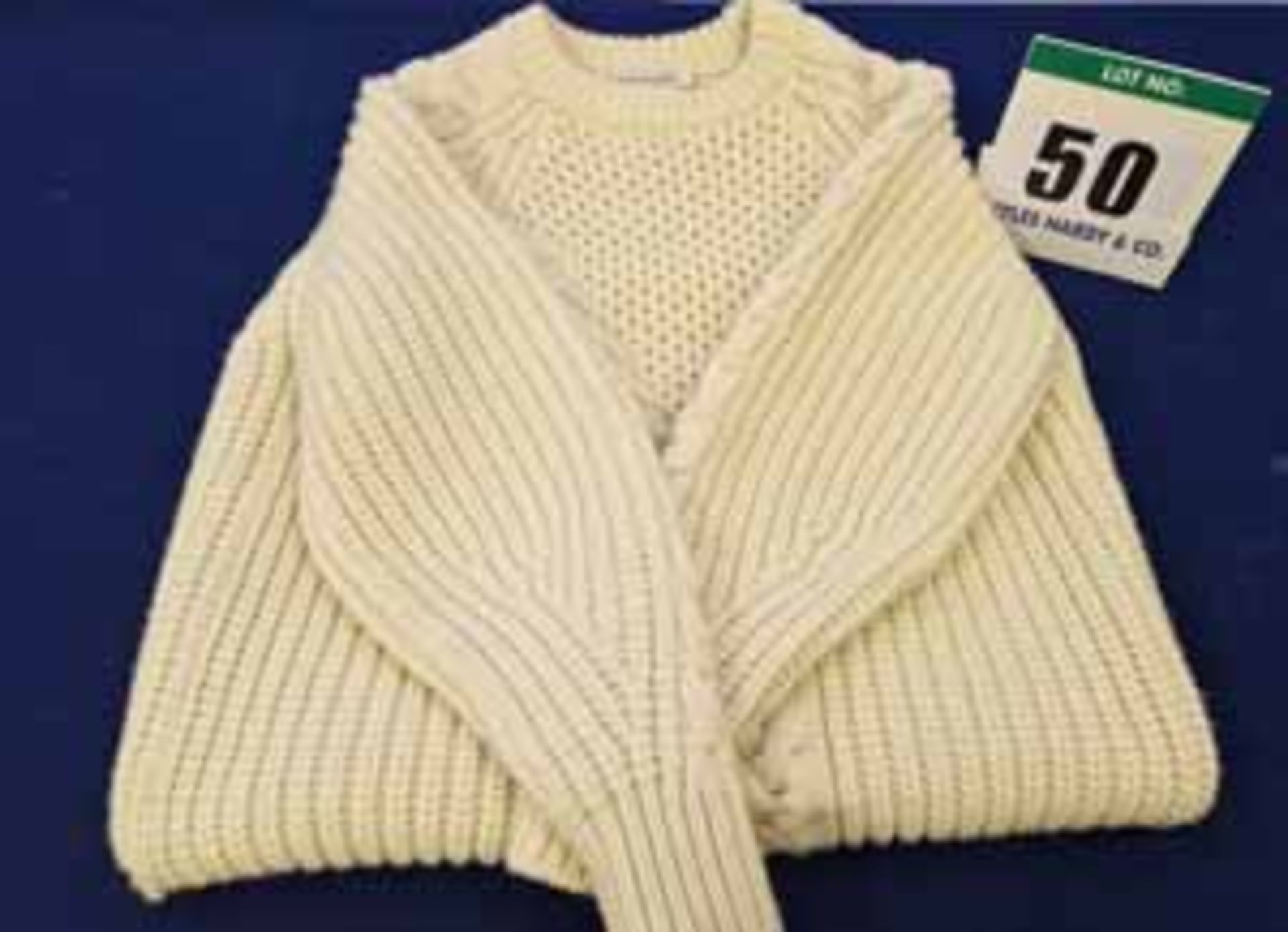 An ALEXANDER MCQUEEN 100 per cent Wool Chunky Knit Fishermans Style Jumper in Cream (Note: Size
