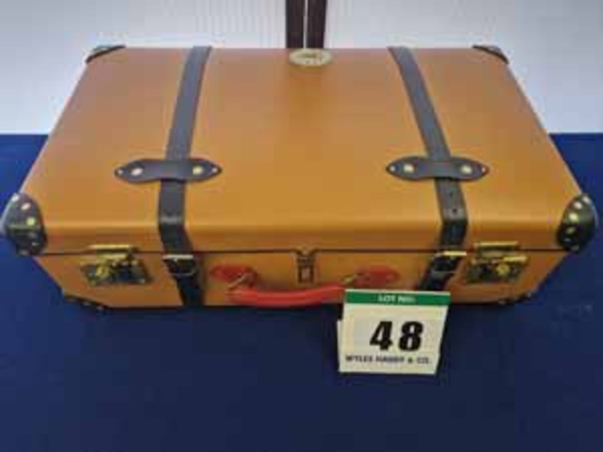 A GLOBE-TROTTER Centenary Medium Check-In Trunk Style Suitcase in Marmalade Orange Leather with Navy