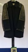 An ALEXANDER McQUEEN 100 per cent Dyed Shearling Lamb Skin Donkey Style Jacket with Viscose