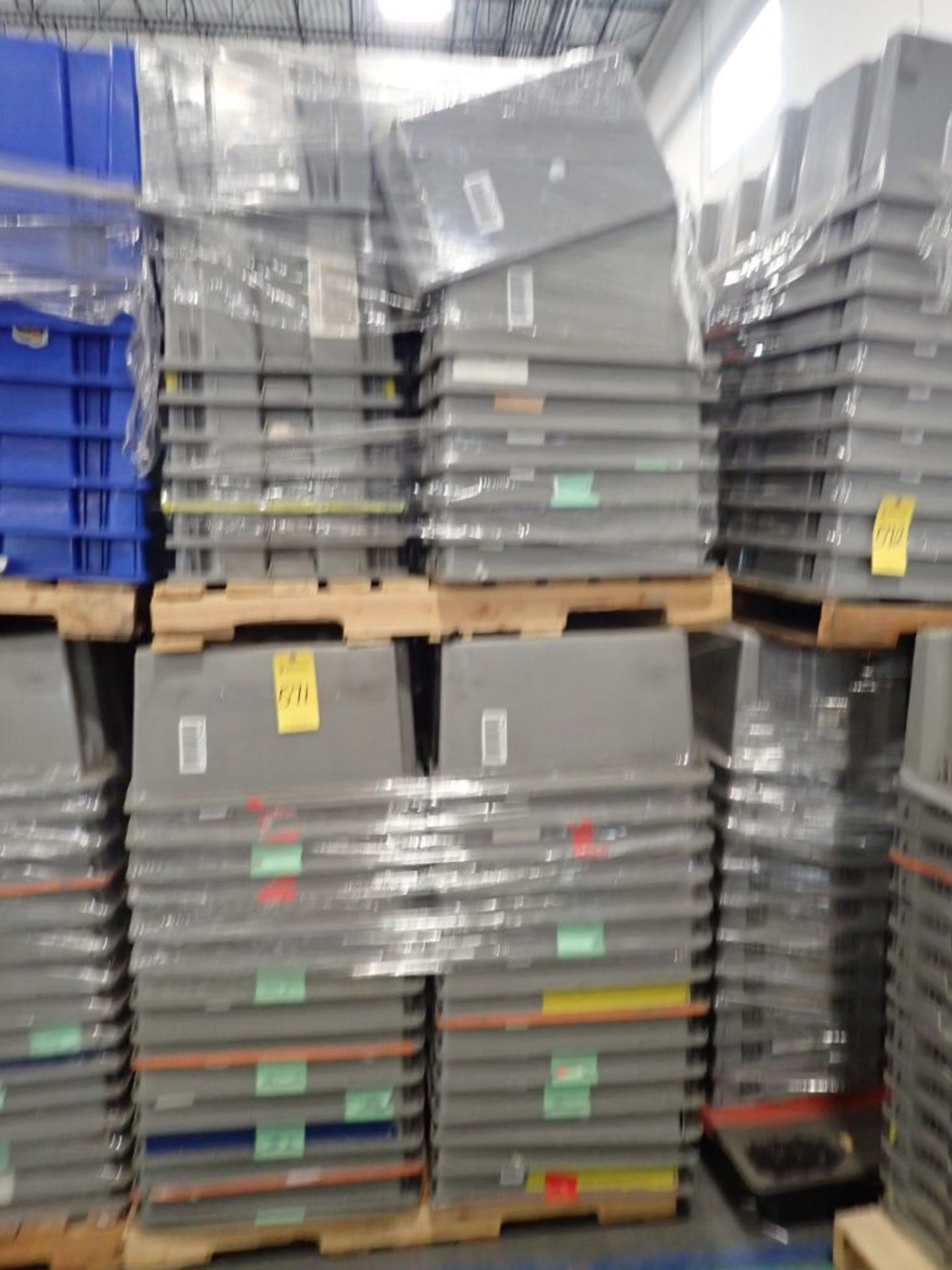 Lot of Approximately (120) Grey Plastic Bins