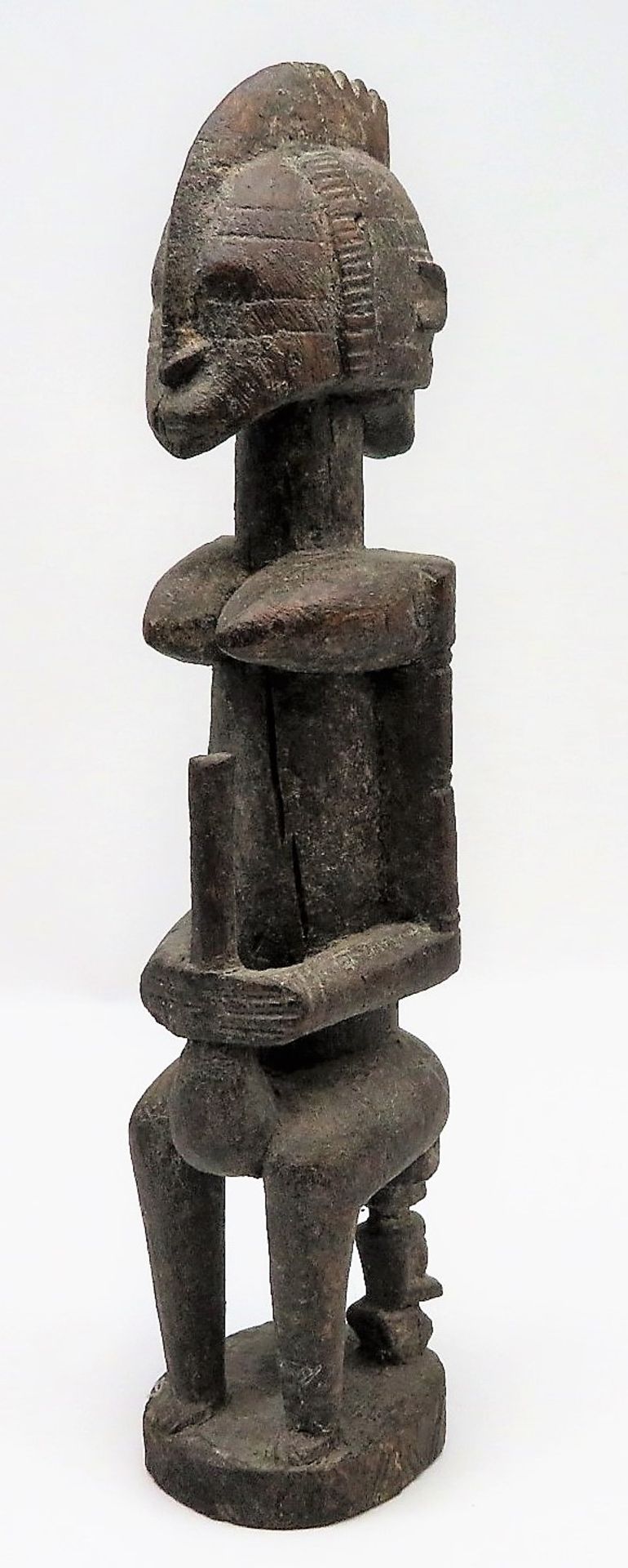 Fruchtbarkeitsfigur, Afrika, Mali, Dogon, Holz geschnitzt, Reste von Fassung, h 43 cm, d 9,5 cm.