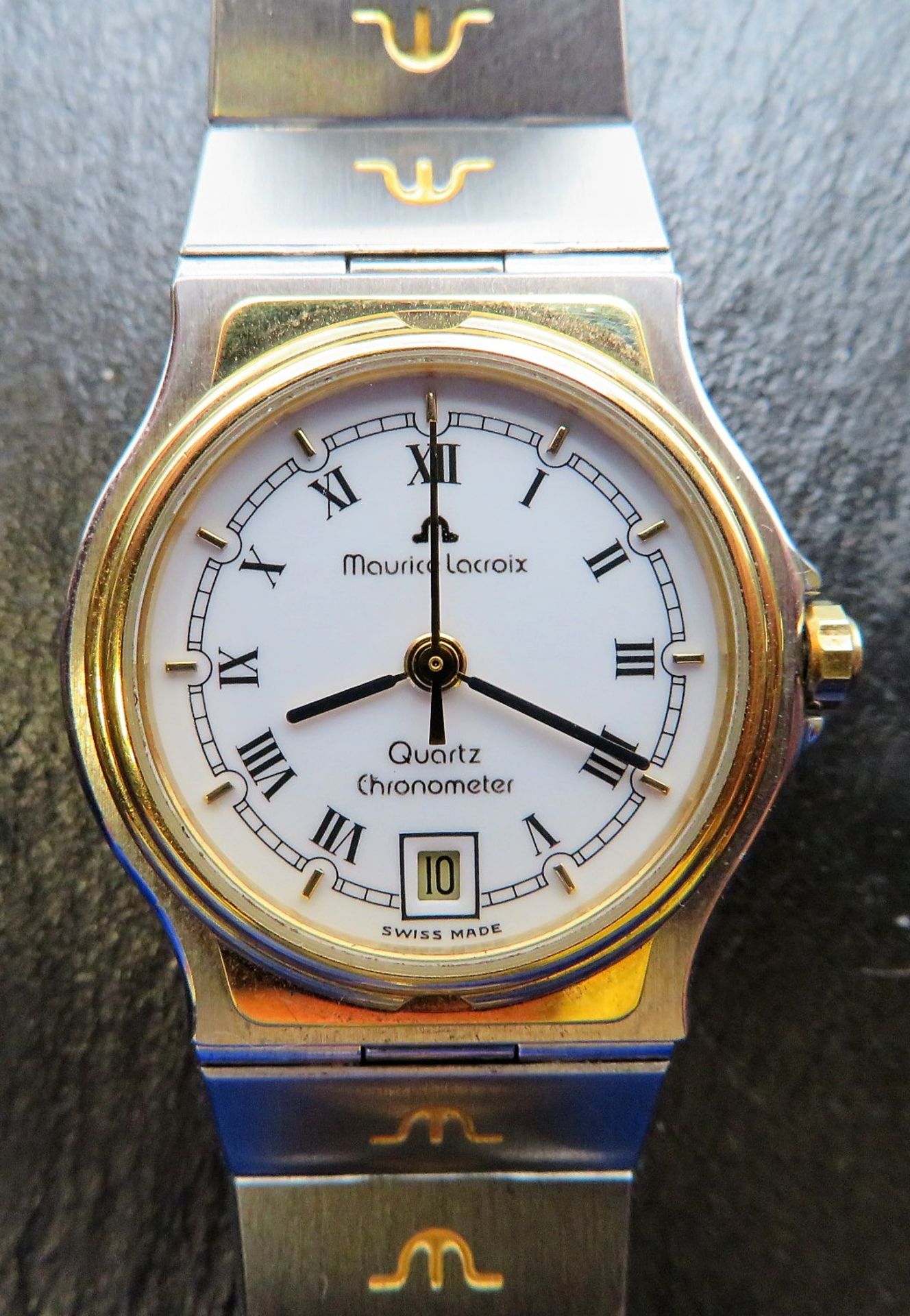 DAU, Maurice Lacroix, Chronomètre, Ref. 19796, Gehäuse und Band Stahl/Gold, Datumsanzeige, Quarzwer