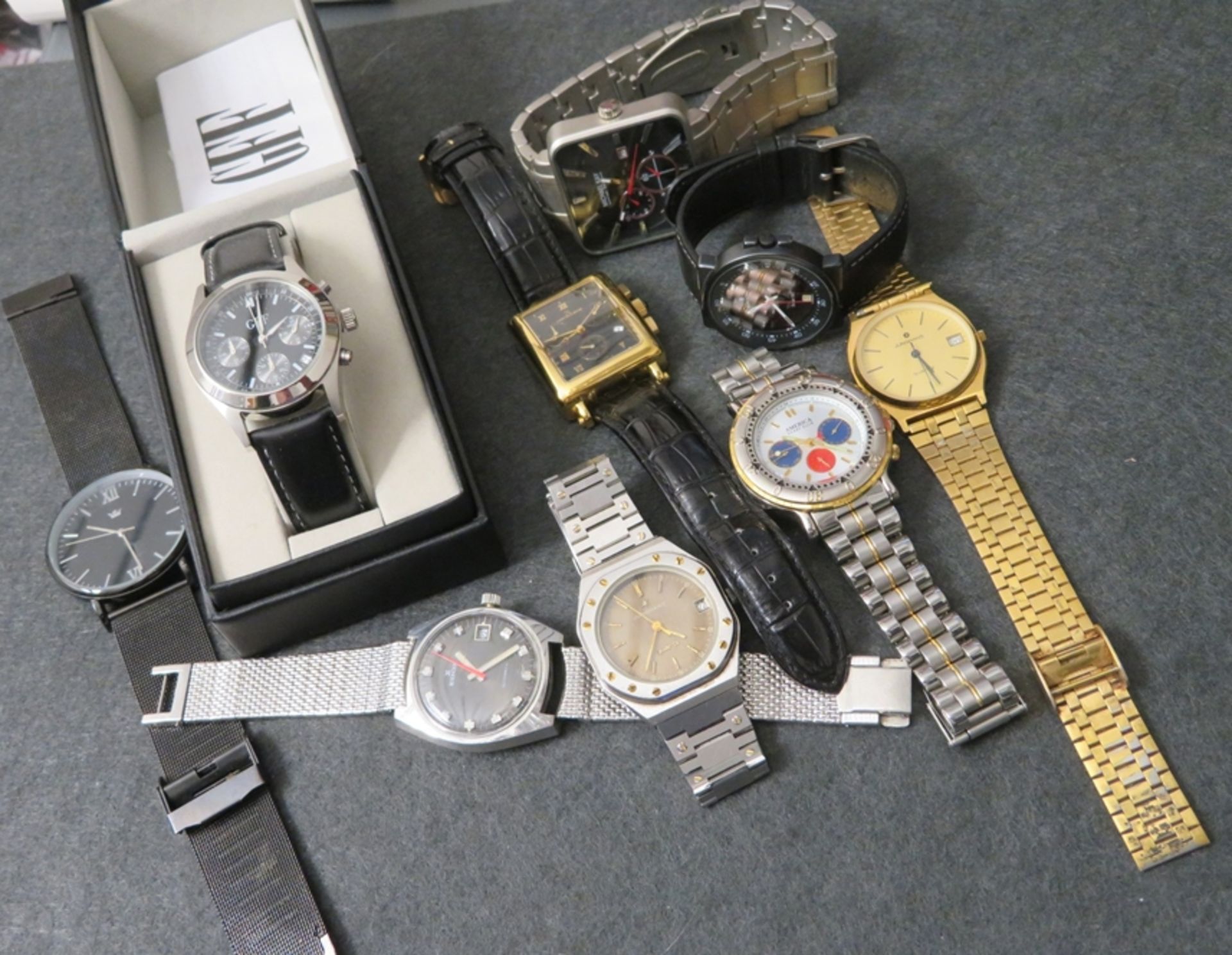 Konvolut von 8 diversen Armbanduhren diverser Marken, u.a. 3 x Junghans, Edox, America, Michael Kay