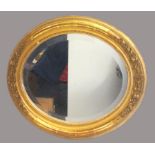 Ovaler Biedermeier Spiegel, 19. Jahrhundert, Stuck vergoldet, facettiertes Spiegelglas, 60 x 50,5 c