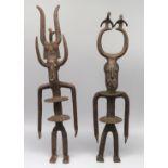 2 Ahnenfiguren, Afrika, wohl Benin, Bronze, h 35 cm, d 9 cm.