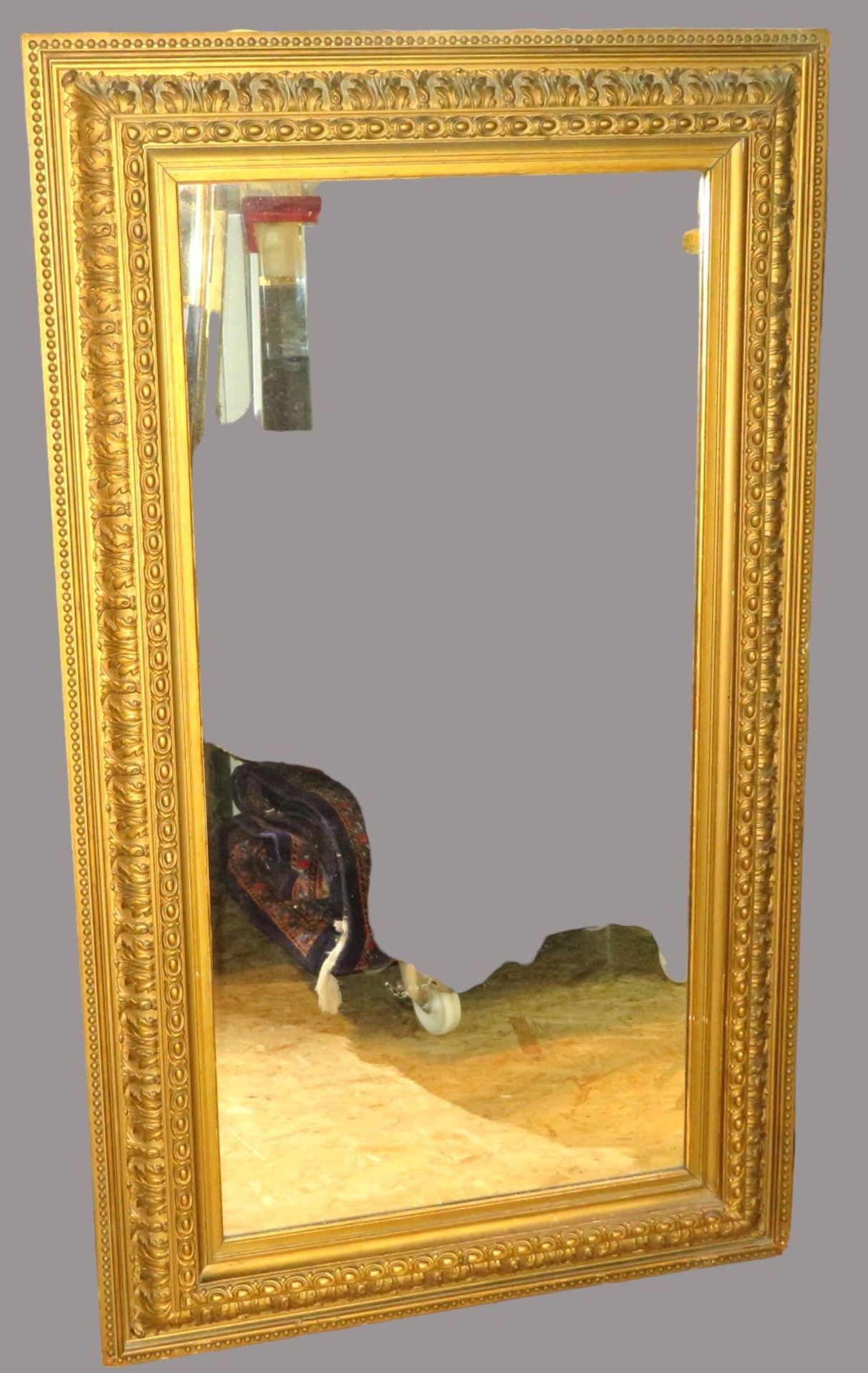 Spiegel, 19. Jahrhundert, Stuck vergoldet, 142 x 84 cm.