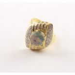 OPAL-RING, 750/ooo Gelbgold, besetzt mit einer Opaltriplette und Brillanten von zusammen ca.0,7 ct.