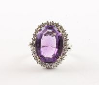 AMETHYST-BRILLANT-RING, 750/ooo Weißgold, Juwelier VASSILIOU, besetzt mit einem Amethysten von ca. 