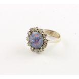 OPAL-BRILLANT-RING, 585/ooo Weißgold, Opaldoublette mit Diamantsaum von ca. 1,0 ct., RG 53, Ringsc