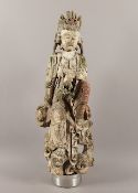 POTALAKA-GUANYIN, Holz mit Resten einer Farbfassung, in rajalilasana, dem "Königsspielsitz", auf ei