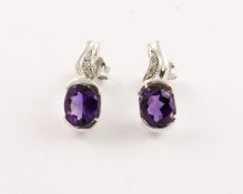 Paar Amethyst-Ohrstecker, 750/ooo WG