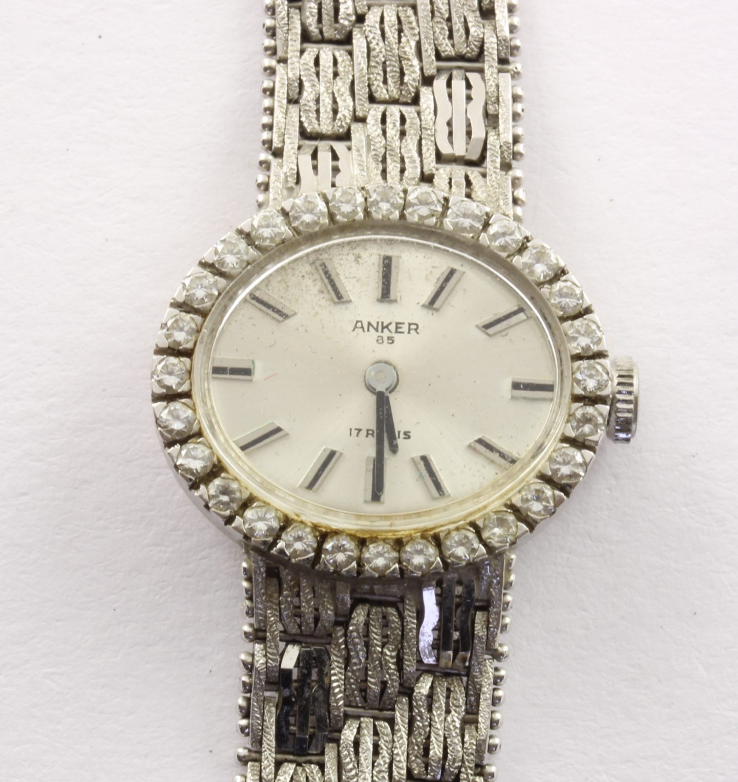 Armbanduhr, 585/ooo WG, ANKER, mit Brill., Handaufzug, 35,7g
