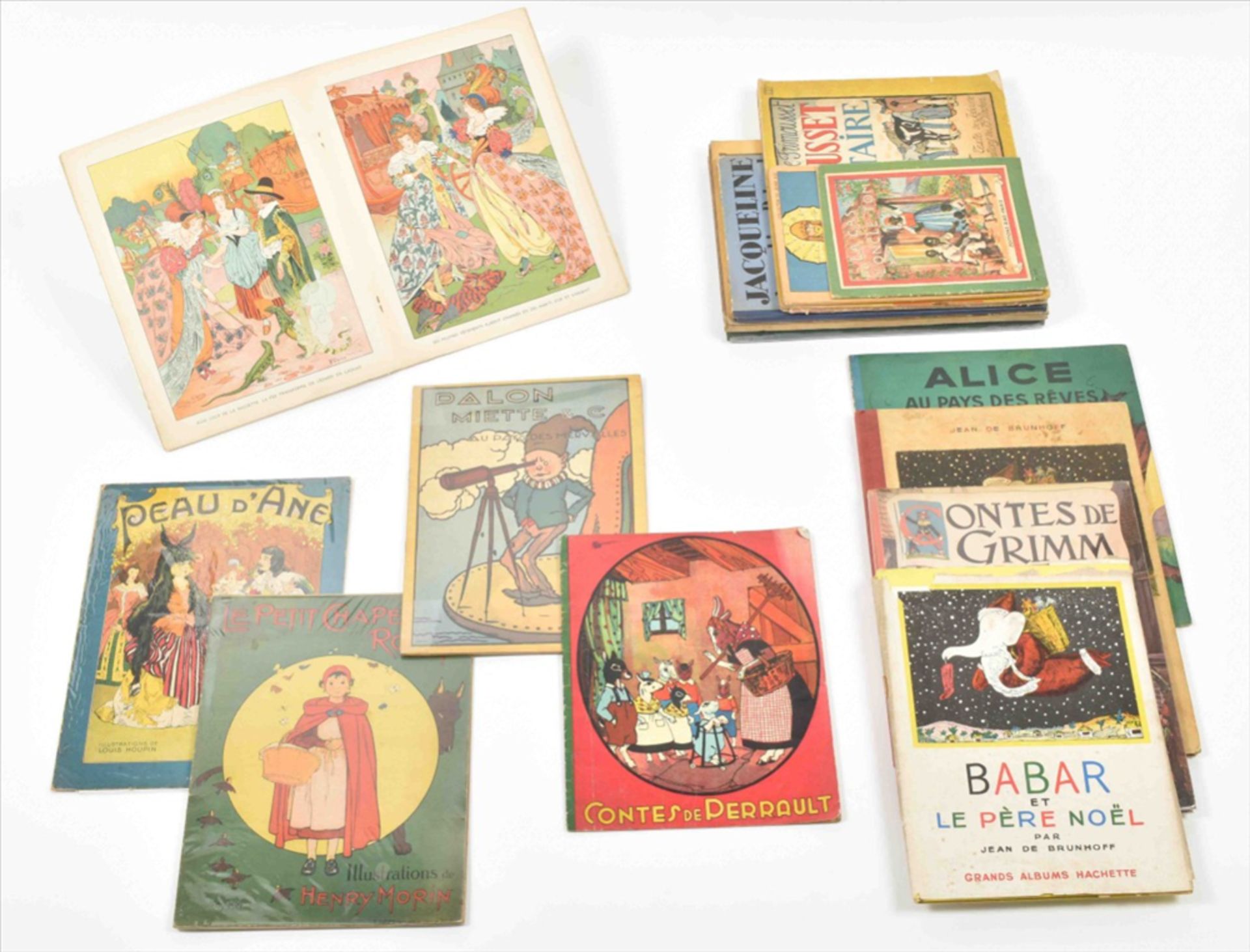 [French Children's books] Lot of seventeen. Including: (1) J. de Brunhoff. Babar et le père noël