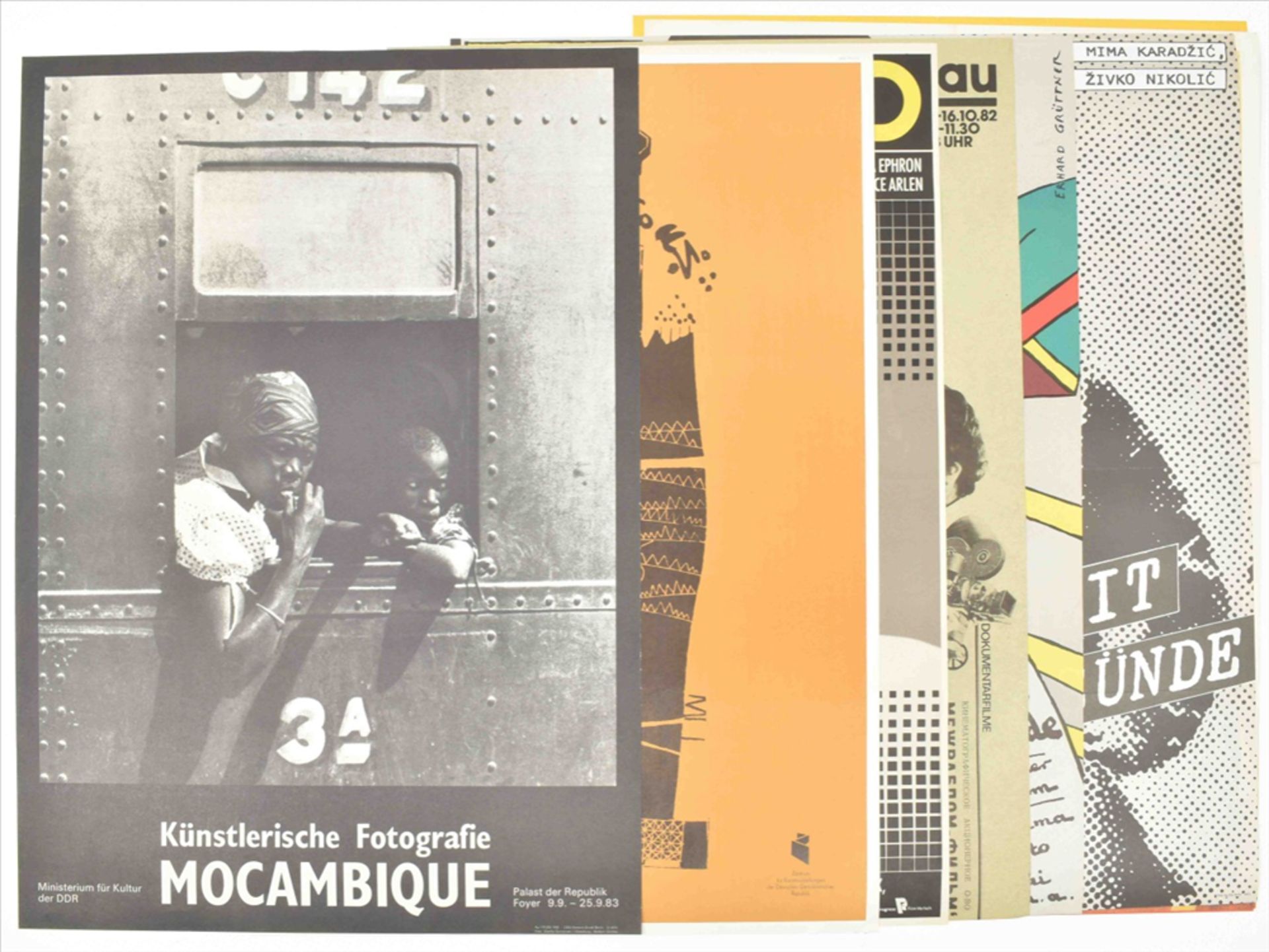 [DDR] Twelve East German movie and exhibition posters: (1) Künstlerische Fotografie Mocambique