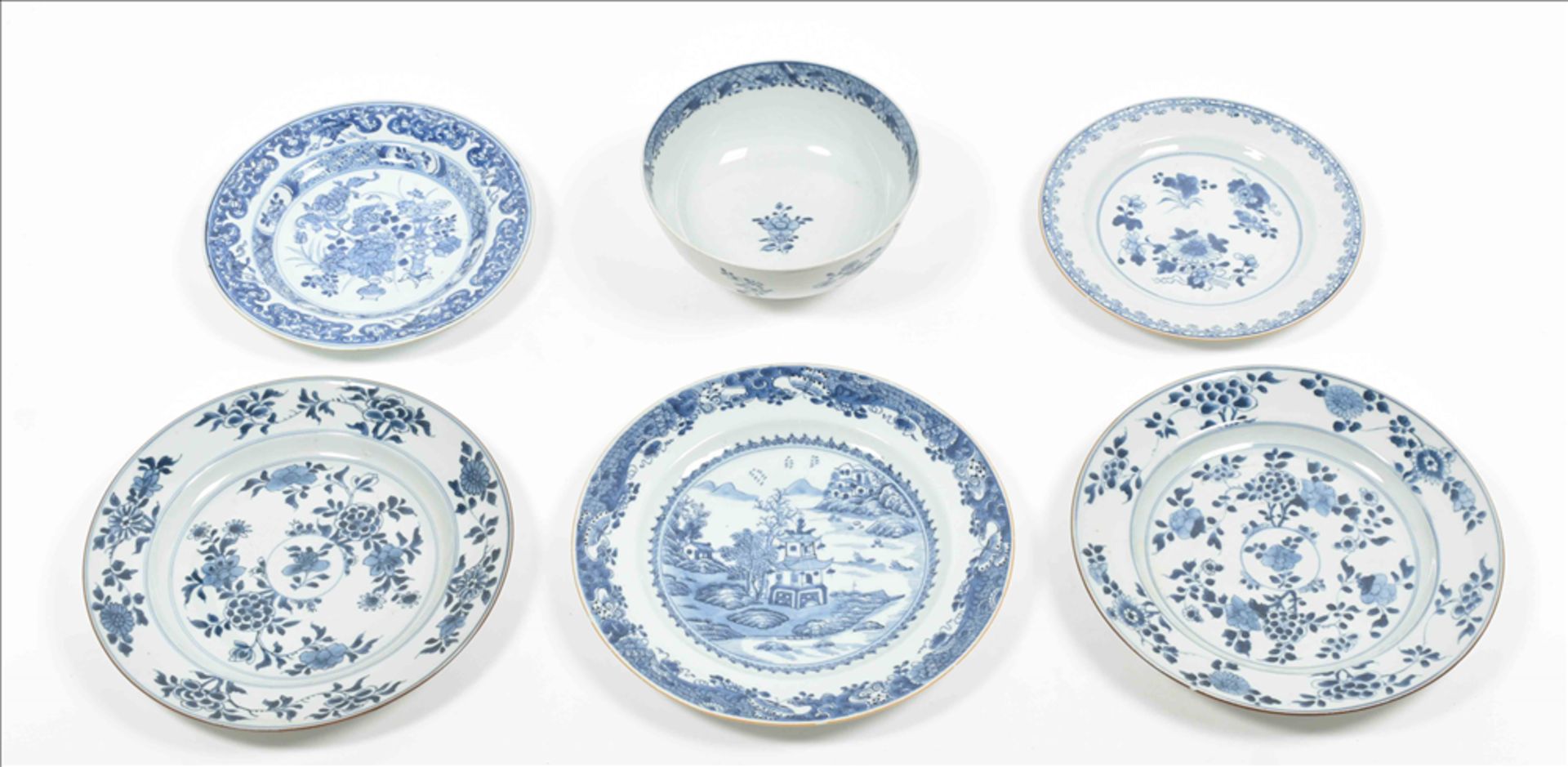 Five porcelain plates and a bowl