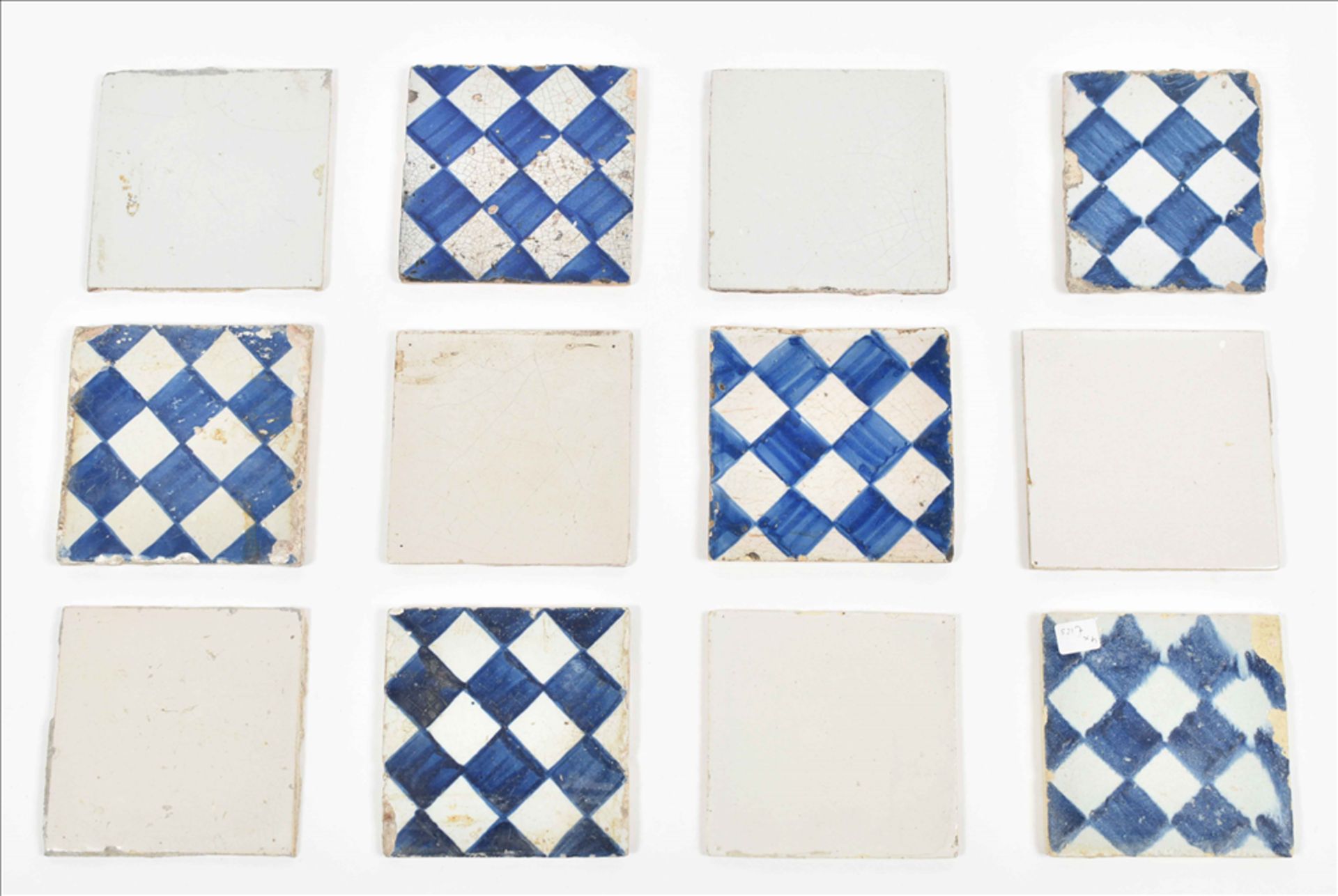 Set of seven Dutch tiles with diamond pattern