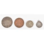 Four various commemorative coins
