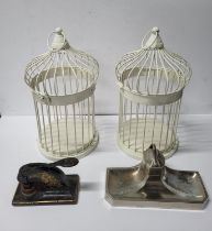 Two bird cages and other peices of metalware including a stamper (4)