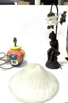 Ornate table lamp along with glass ceiling lamp shade and ceramic lamp base