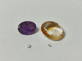 Two tiny Diamonds, an Amethyst and an Aquamarine stone (4)